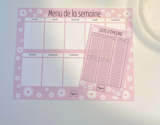 alt="Planificateur de repas hebdomadaire Pink Era avec des marguerites blanches, design simple et féminin de couleur rose, sections dédiées pour chaque jour et collations, grand espace pour noter idées de repas et articles à acheter, format compact 8.5 x 11 pouces, 40 pages, option aimants, papier cartonné épais pour une durabilité supérieure."
